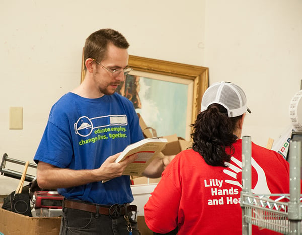 Peter walks volunteers with Lilly's Global Day of Service through his process